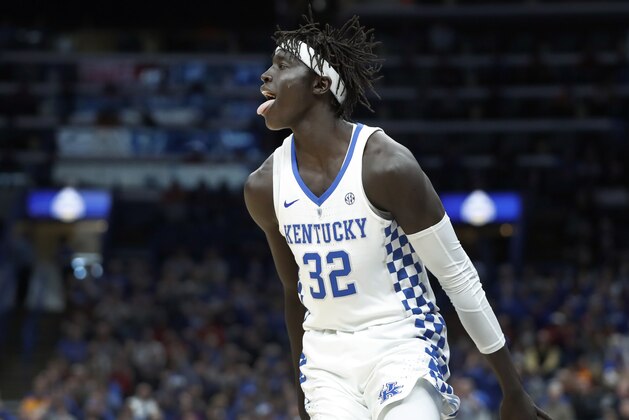 Kentucky's Wenyen Gabriel celebrates after making a thee-point basket during the second half of an NCAA college basketball semifinal game against Alabama at the Southeastern Conference tournament Saturday, March 10, 2018, in St. Louis. Kentucky won 86-63. (AP Photo/Jeff Roberson)