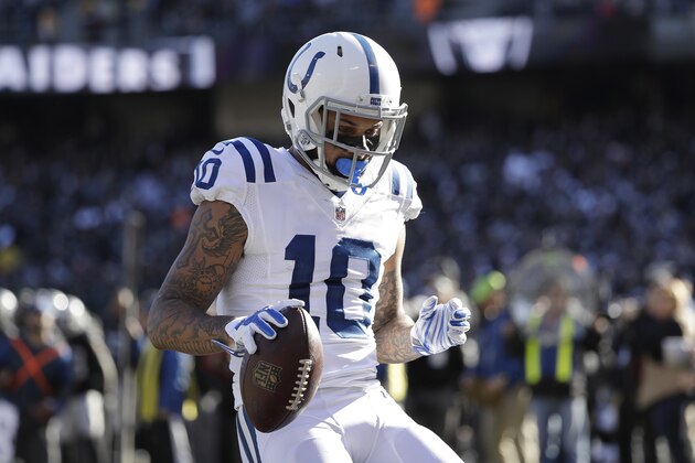 Indianapolis Colts wide receiver Donte Moncrief (10) reacts after catching a touchdown against the Oakland Raidersduring the first half of an NFL football game in Oakland, Calif., Saturday, Dec. 24, 2016. (AP Photo/Marcio Jose Sanchez)