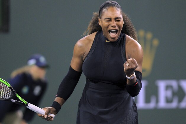 Serena Williams clenches her fist while playing Zarina Diyas during the first round of the BNP Paribas Open tennis tournament in Indian Wells, Calif., Thursday, March 8, 2018. (AP Photo/Crystal Chatham)