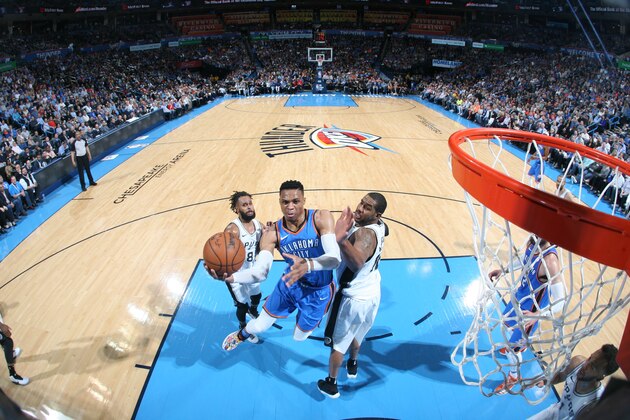 OKLAHOMA CITY, OK - MARCH 10:  Russell Westbrook #0 of the Oklahoma City Thunder drives to the basket against the San Antonio Spurs on March 10, 2018 at Chesapeake Energy Arena in Oklahoma City, Oklahoma. NOTE TO USER: User expressly acknowledges and agrees that, by downloading and or using this photograph, User is consenting to the terms and conditions of the Getty Images License Agreement. Mandatory Copyright Notice: Copyright 2018 NBAE (Photo by Layne Murdoch/NBAE via Getty Images)