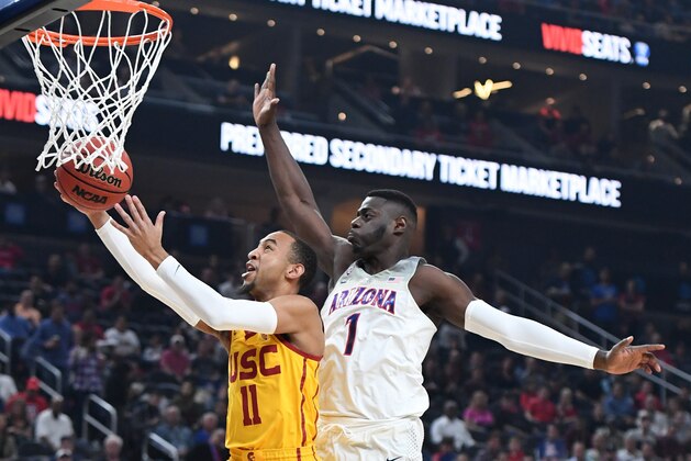 LAS VEGAS, NV - MARCH 10: Jordan McLaughlin #11 of the USC Trojans drivs to the basket against Rawle Alkins #1 of the Arizona Wildcats during the championship game of the Pac-12 basketball tournament at T-Mobile Arena on March 10, 2018 in Las Vegas, Nevada. (Photo by Ethan Miller/Getty Images) LAS VEGAS, NV - MARCH 10: Jordan McLaughlin #11 of the USC Trojans drivs to the basket against Rawle Alkins #1 of the Arizona Wildcats during the championship game of the Pac-12 basketball tournament at T-Mobile Arena on March 10, 2018 in Las Vegas, Nevada. (Photo by Ethan Miller/Getty Images)