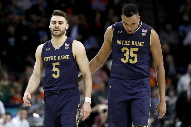 NEW YORK, NY - MARCH 07: Matt Farrell #5 and Bonzie Colson #35 of the Notre Dame Fighting Irish share a moment in the second half against the Virginia Tech Hokies during the second round of the ACC Men's Basketball Tournament at Barclays Center on March 7, 2018 in New York City.  (Photo by Abbie Parr/Getty Images)