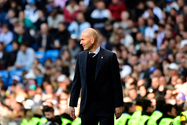 Real Madrid's French coach Zinedine Zidane looks on during the Spanish league football match between Real Madrid CF and Deportivo Alaves at the Santiago Bernabeu stadium in Madrid on February 24, 2018. / AFP PHOTO / PIERRE-PHILIPPE MARCOU        (Photo credit should read PIERRE-PHILIPPE MARCOU/AFP/Getty Images)