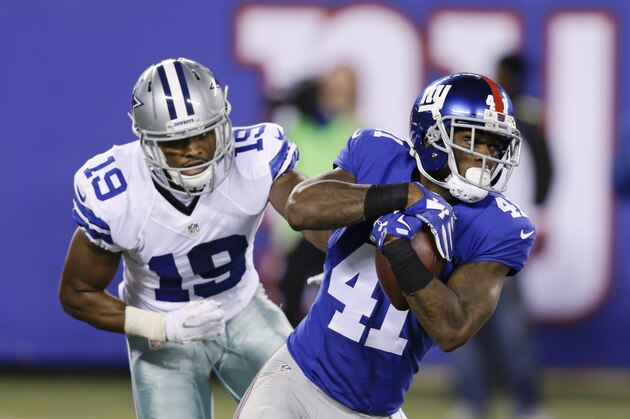 New York Giants cornerback Dominique Rodgers-Cromartie (41) intercepts a pass to Dallas Cowboys' Brice Butler (19) during the second half of an NFL football game Sunday, Oct. 25, 2015, in East Rutherford, N.J. (AP Photo/Seth Wenig)