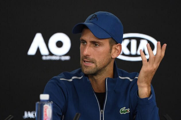 Serbia's Novak Djokovic speaks during a press conference after his loss to South Korea's Hyeon Chung in their men's singles fourth round match on day eight of the Australian Open tennis tournament in Melbourne on January 22, 2018. / AFP PHOTO / WILLIAM WEST / -- IMAGE RESTRICTED TO EDITORIAL USE - STRICTLY NO COMMERCIAL USE --        (Photo credit should read WILLIAM WEST/AFP/Getty Images)