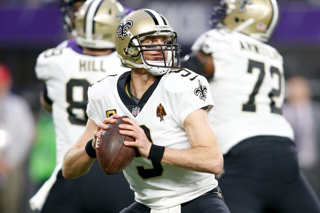 MINNEAPOLIS, MN - JANUARY 14:  Drew Brees #9 of the New Orleans Saints looks to pass against the Minnesota Vikings during the first half of the NFC Divisional Playoff game at U.S. Bank Stadium on January 14, 2018 in Minneapolis, Minnesota.  (Photo by Jamie Squire/Getty Images)