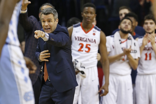Virginia head coach Tony Bennett directs his team during the second half of an NCAA college basketball game in Charlottesville, Va., Monday, Feb. 27, 2017. Virginia defeated North Carolina 53-43. (AP Photo/Steve Helber)