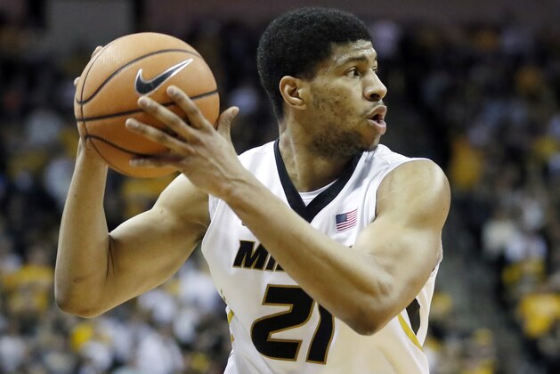 FILE - In this Jan. 24, 2018, file photo, Missouri's Jordan Barnett looks to pass the ball against Auburn during the second half of an NCAA college basketball game in Columbia, Mo. Barnett has been arrested on suspicion of driving while intoxicated. Spokesperson Brian Weimer of the Missouri University Police Department says Barnett was arrested at early Saturday morning, March 10, 2018. The report indicated Barnett failed to drive within a single lane. (AP Photo/Jeff Roberson,File)
