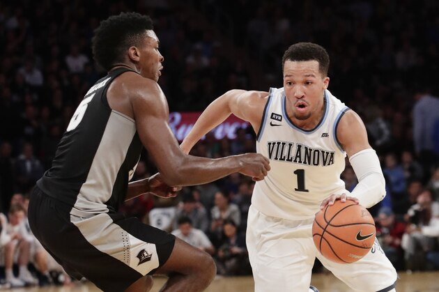 Villanova's Jalen Brunson (1) drives past Providence's Rodney Bullock (5) during the first half of an NCAA college basketball game in the Big East men's tournament final Saturday, March 10, 2018, in New York. (AP Photo/Frank Franklin II)