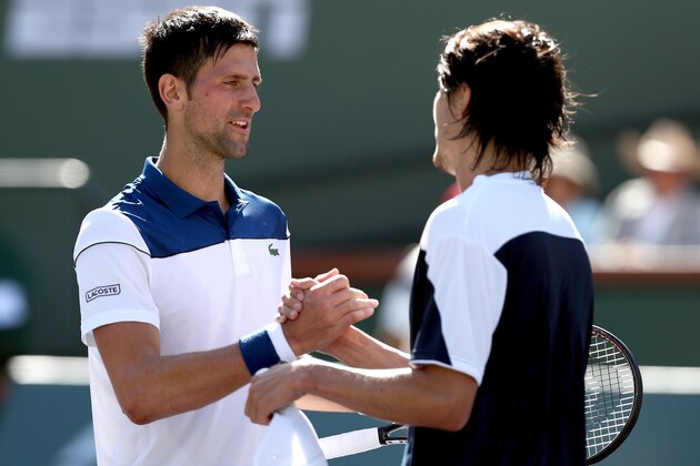 INDIAN WELLS, CA - MARCH 11:  Novak Djokovic of Serbia congratulates Taro Daniel of Japan after their match during the BNP Paribas Open at the Indian Wells Tennis Garden on March 11, 2018 in Indian Wells, California.  (Photo by Matthew Stockman/Getty Images)