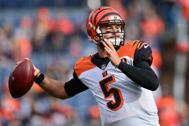 DENVER, CO - NOVEMBER 19:  Quarterback AJ McCarron #5 of the Cincinnati Bengals throws as he warms up before a game against the Denver Broncos at Sports Authority Field at Mile High on November 19, 2017 in Denver, Colorado. (Photo by Dustin Bradford/Getty Images)