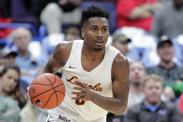 Loyola's Donte Ingram (0) brings the ball up court during the second half of an NCAA college basketball game against Northern Iowa in the quarterfinals of the Missouri Valley Conference tournament, Friday, March 2, 2018, in St. Louis. Ingram led his team with 13 points as Loyola beat Northern Iowa 54-50. (AP Photo/Tom Gannam)