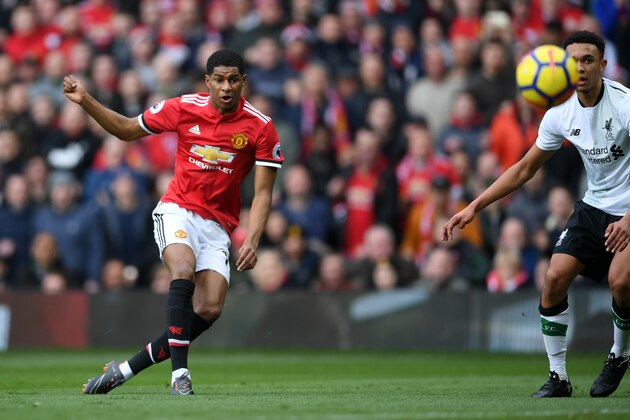 MANCHESTER, ENGLAND - MARCH 10:  Marcus Rashford of Manchester United scores his side's first goal during the Premier League match between Manchester United and Liverpool at Old Trafford on March 10, 2018 in Manchester, England.  (Photo by Laurence Griffiths/Getty Images)