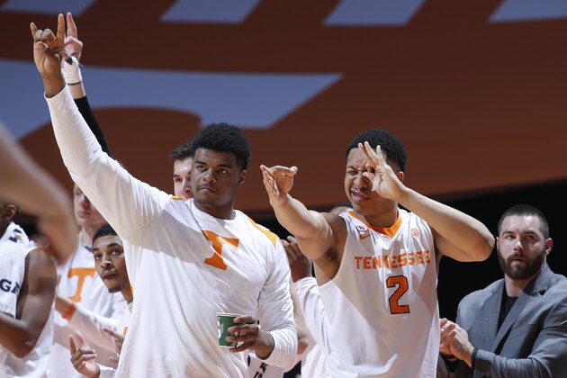 KNOXVILLE, TN - FEBRUARY 21: Grant Williams #2 and Derrick Walker #15 of the Tennessee Volunteers react after a three-point basket against the Florida Gators in the second half of a game at Thompson-Boling Arena on February 21, 2018 in Knoxville, Tennessee. Tennessee won 62-57. (Photo by Joe Robbins/Getty Images)