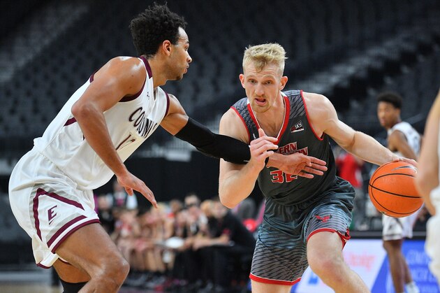LAS VEGAS, NV - NOVEMBER 22:  Bogdan Bliznyuk #32 of the Eastern Washington Eagles drives against Zach Charles #12 of the Eastern Kentucky Colonels during day two of the Main Event basketball tournament at T-Mobile Arena on November 22, 2017 in Las Vegas, Nevada.  (Photo by Sam Wasson/Getty Images)