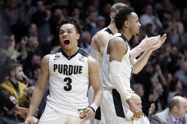Purdue guard Carsen Edwards (3) reacts on the bench to a dunk in the second half of an NCAA college basketball game against Minnesota in West Lafayette, Ind., Sunday, Feb. 25, 2018. (AP Photo/Michael Conroy)