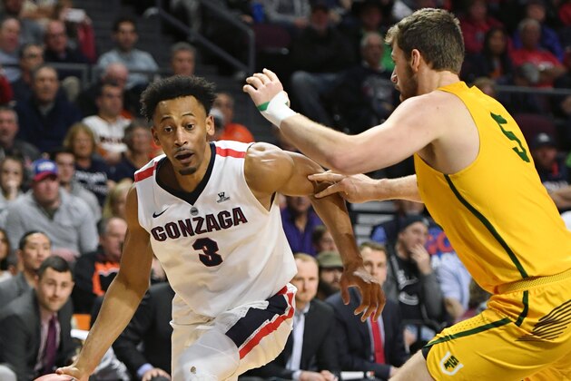 LAS VEGAS, NV - MARCH 05:  Johnathan Williams #3 of the Gonzaga Bulldogs drives against Jimbo Lull #5 of the San Francisco Dons during a semifinal game of the West Coast Conference basketball tournament at the Orleans Arena on March 5, 2018 in Las Vegas, Nevada. The Bulldogs won 88-60.  (Photo by Ethan Miller/Getty Images)