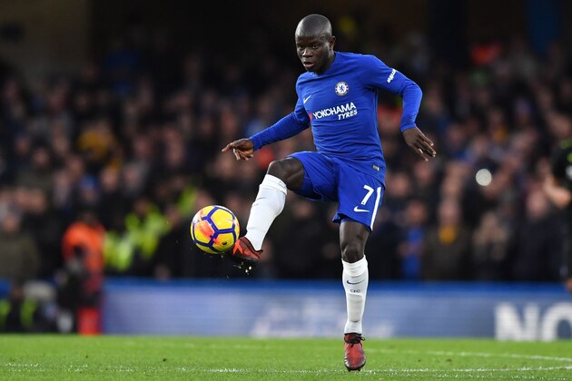 Chelsea's French midfielder N'Golo Kante passes the ball during the English Premier League football match between Chelsea and Brighton and Hove Albion at Stamford Bridge in London on December 26, 2017. / AFP PHOTO / Ben STANSALL / RESTRICTED TO EDITORIAL USE. No use with unauthorized audio, video, data, fixture lists, club/league logos or 'live' services. Online in-match use limited to 75 images, no video emulation. No use in betting, games or single club/league/player publications.  /         (Photo credit should read BEN STANSALL/AFP/Getty Images)