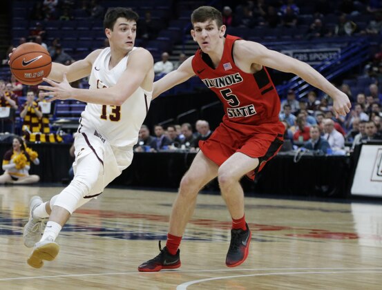 Loyola's Clayton Custer (13) drives the ball around Illinois State's Matt Hein (5) during the first half of an NCAA college basketball game in the championship of the Missouri Valley Conference tournament, Sunday, March 4, 2018, in St. Louis. (AP Photo/Tom Gannam)
