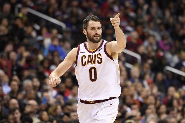 Cleveland Cavaliers forward Kevin Love (0) points after he scored during the second half of an NBA basketball game against the Washington Wizards, Sunday, Dec. 17, 2017, in Washington. The Cavaliers won 106-99. (AP Photo/Nick Wass)