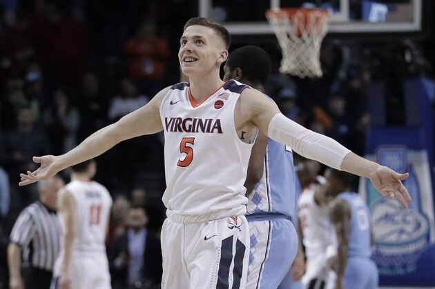 Virginia guard Kyle Guy (5) celebrates as the final seconds wind off the clock against North Carolina in the championship game of an NCAA college basketball game during the Atlantic Coast Conference men's tournament Saturday, March 10, 2018, in New York. (AP Photo/Julie Jacobson) Virginia guard Kyle Guy (5) celebrates as the final seconds wind off the clock against North Carolina in the championship game of an NCAA college basketball game during the Atlantic Coast Conference men's tournament Saturday, March 10, 2018, in New York. (AP Photo/Julie Jacobson)
