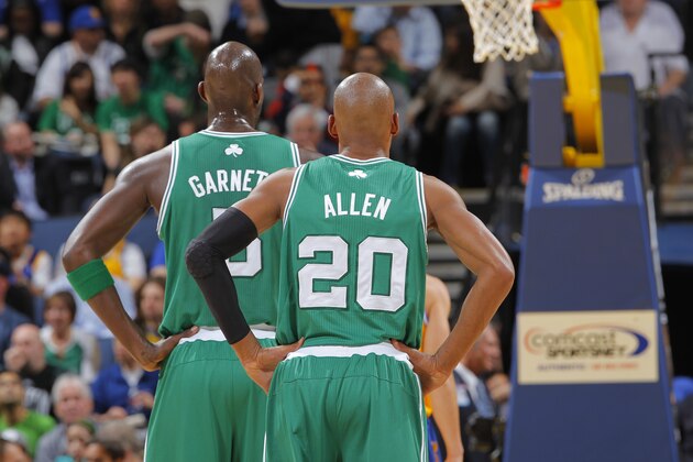 OAKLAND, CA - FEBRUARY 22: Teammates Ray Allen #20 and Kevin Garnett #5 of the Boston Celtics watch their teammate attempt a free throw during a game against the Golden State Warriors on February 22, 2011 at Oracle Arena in Oakland, California. NOTE TO USER: User expressly acknowledges and agrees that, by downloading and or using this photograph, user is consenting to the terms and conditions of Getty Images License Agreement. Mandatory Copyright Notice: Copyright 2011 NBAE (Photo by Rocky Widner/NBAE via Getty Images)