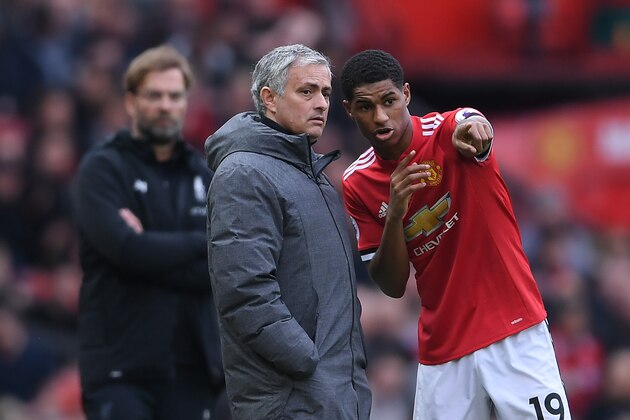 MANCHESTER, ENGLAND - MARCH 10:  Jose Mourinho of Manchester United speaks to Marcus Rashford as Jurgen Klopp of Liverpool looks on during the Premier League match between Manchester United and Liverpool at Old Trafford on March 10, 2018 in Manchester, England.  (Photo by Laurence Griffiths/Getty Images)