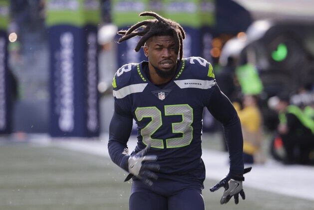 Seattle Seahawks defensive back Neiko Thorpe runs out of the tunnel before an NFL football game against the Arizona Cardinals, Sunday, Dec. 31, 2017, in Seattle. (AP Photo/Elaine Thompson)