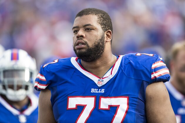 ORCHARD PARK, NY - OCTOBER 22:  Cordy Glenn #77 of the Buffalo Bills watches game action against the Tampa Bay Buccaneers at New Era Field on October 22, 2017 in Orchard Park, New York. Buffalo defeats Tampa Bay 30-27.  (Photo by Brett Carlsen/Getty Images)
