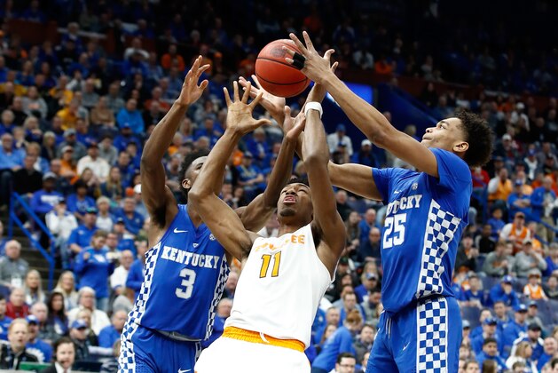ST LOUIS, MO - MARCH 11:  Hamidou Diallo #3 and PJ Washington #25 of the Kentucky Wildcats battle for a rebound with Kyle Alexander #11 of the Tennessee Volunteers during the Championship game of the 2018 SEC Basketball Tournament at Scottrade Center on March 11, 2018 in St Louis, Missouri.  (Photo by Andy Lyons/Getty Images)