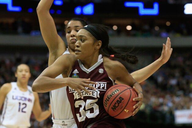 DALLAS, TX - MARCH 31:  Victoria Vivians #35 of the Mississippi State Lady Bulldogs drives against Gabby Williams #15 of the Connecticut Huskies in the first half during the semifinal round of the 2017 NCAA Women's Final Four at American Airlines Center on March 31, 2017 in Dallas, Texas.  (Photo by Ron Jenkins/Getty Images)