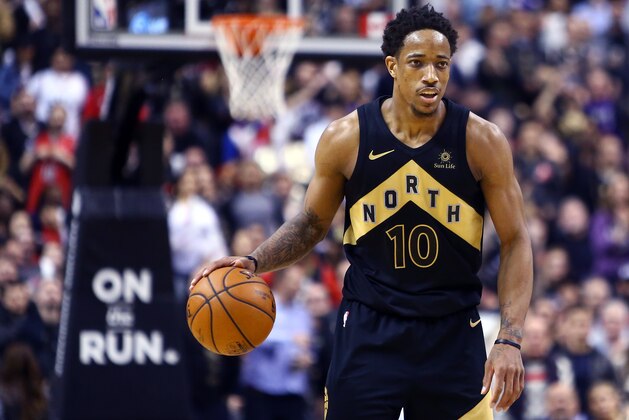 TORONTO, ON - MARCH 9:  DeMar DeRozan #10 of the Toronto Raptors dribbles the ball during the second half of an NBA game against the Houston Rockets at Air Canada Centre on March 9, 2018 in Toronto, Canada.  NOTE TO USER: User expressly acknowledges and agrees that, by downloading and or using this photograph, User is consenting to the terms and conditions of the Getty Images License Agreement.  (Photo by Vaughn Ridley/Getty Images)