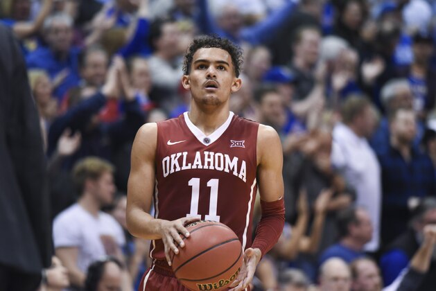 LAWRENCE, KS - FEBRUARY 19: Trae Young #11 of the Oklahoma Sooners in action against the Kansas Jayhawks at Allen Fieldhouse on February 19, 2018 in Lawrence, Kansas. (Photo by Ed Zurga/Getty Images)