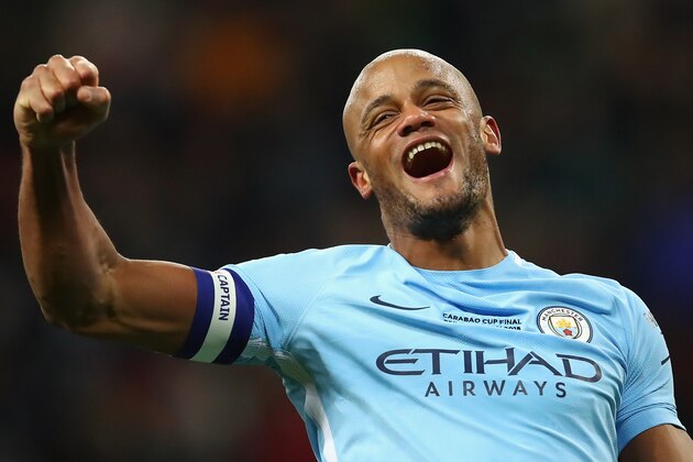 LONDON, ENGLAND - FEBRUARY 25:  Vincent Kompany of Manchester City celebrates after winning the Carabao Cup Final between Arsenal and Manchester City at Wembley Stadium on February 25, 2018 in London, England.  (Photo by Julian Finney/Getty Images)