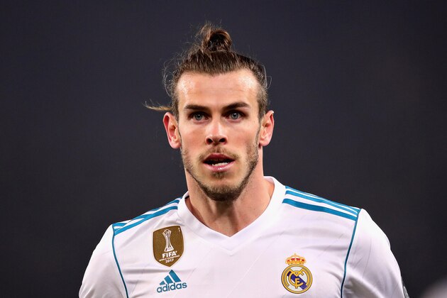 PARIS, FRANCE - MARCH 06: Gareth Bale of Real Madrid looks on during the UEFA Champions League Round of 16 Second Leg match between Paris Saint-Germain and Real Madrid at Parc des Princes on March 6, 2018 in Paris, France.  (Photo by Chris Brunskill Ltd/Getty Images)
