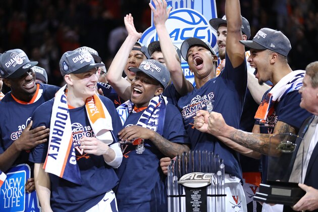 NEW YORK, NY - MARCH 10:  Kyle Guy #5 of the Virginia Cavaliers celebrates with teammats after being named tournament MVP after defeating the North Carolina Tar Heels 71-63 during the championship game of the 2018 ACC Men's Basketball Tournament at Barclays Center on March 10, 2018 in the Brooklyn borough of New York City.  (Photo by Abbie Parr/Getty Images)