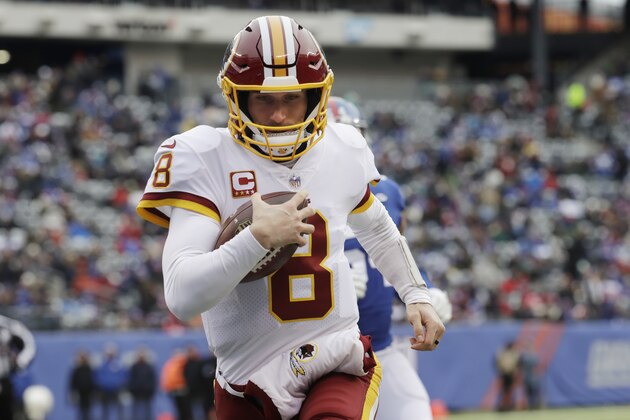 Washington Redskins quarterback Kirk Cousins (8) rushes for a touchdown during the first half of an NFL football game against the New York Giants Sunday, Dec. 31, 2017, in East Rutherford, N.J. (AP Photo/Mark Lennihan) Washington Redskins quarterback Kirk Cousins (8) rushes for a touchdown during the first half of an NFL football game against the New York Giants Sunday, Dec. 31, 2017, in East Rutherford, N.J. (AP Photo/Mark Lennihan)