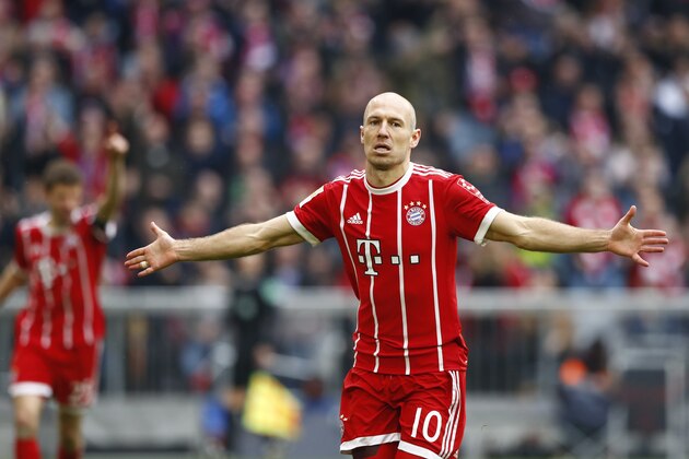 Bayern's Arjen Robben celebrates after scoring his side's fourth goal during the German Soccer Bundesliga match between FC Bayern Munich and Hamburger SV in Munich, Germany, Saturday, March 10, 2018. (AP Photo/Matthias Schrader)