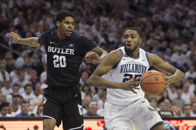 PHILADELPHIA, PA - FEBRUARY 10: Mikal Bridges #25 of the Villanova Wildcats drives to the basket against Henry Baddley #20 of the Butler Bulldogs at the Wells Fargo Center on February 10, 2018 in Philadelphia, Pennsylvania. (Photo by Mitchell Leff/Getty Images)