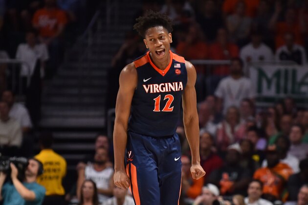 MIAMI, FL - FEBRUARY 13: De'Andre Hunter #12 of the Virginia Cavaliers reacts after hitting a three pointer in the second half of the game against the Miami Hurricanes at The Watsco Center on February 13, 2018 in Miami, Florida. (Photo by Eric Espada/Getty Images)