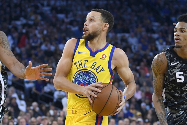 OAKLAND, CA - MARCH 08:  Stephen Curry #30 of the Golden State Warriors drives towards the basket on LaMarcus Aldridge #12 and Dejounte Murray #5 of the San Antonio Spurs during an NBA basketball game at ORACLE Arena on March 8, 2018 in Oakland, California. NOTE TO USER: User expressly acknowledges and agrees that, by downloading and or using this photograph, User is consenting to the terms and conditions of the Getty Images License Agreement.  (Photo by Thearon W. Henderson/Getty Images)