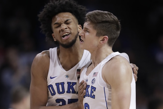 Duke forward Marvin Bagley III (35) and guard Grayson Allen (3) react after Allen scored against Notre Dame during the first half of an NCAA college basketball game in the Atlantic Coast Conference men's tournament Thursday, March 8, 2018, in New York. (AP Photo/Julie Jacobson) Duke forward Marvin Bagley III (35) and guard Grayson Allen (3) react after Allen scored against Notre Dame during the first half of an NCAA college basketball game in the Atlantic Coast Conference men's tournament Thursday, March 8, 2018, in New York. (AP Photo/Julie Jacobson)