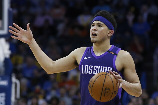 Phoenix Suns guard Devin Booker during an NBA basketball game against the Oklahoma City Thunder in Oklahoma City, Thursday, March 8, 2018. (AP Photo/Sue Ogrocki)