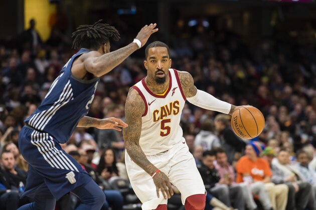 CLEVELAND, OH - MARCH 5: Reggie Bullock #25 of the Detroit Pistons guards JR Smith #5 of the Cleveland Cavaliers during the second half at Quicken Loans Arena on March 5, 2018 in Cleveland, Ohio. The Cavaliers defeated the Pistons 112-90. NOTE TO USER: User expressly acknowledges and agrees that, by downloading and or using this photograph, User is consenting to the terms and conditions of the Getty Images License Agreement. (Photo by Jason Miller/Getty Images)