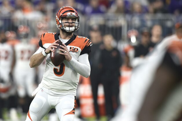 MINNEAPOLIS, MN - DECEMBER 17: AJ McCarron #5 of the Cincinnati Bengals looks to pass the ball in the fourth quarter of the game against the Minnesota Vikings on December 17, 2017 at U.S. Bank Stadium in Minneapolis, Minnesota. (Photo by Hannah Foslien/Getty Images)