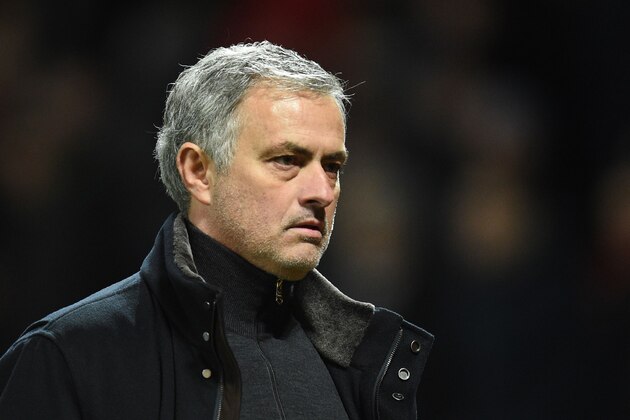 Manchester United's Portuguese manager Jose Mourinho leaves the pitch after losing a last 16 second leg UEFA Champions League football match between Manchester United and Sevilla at Old Trafford in Manchester, northwest England on March 13, 2018. / AFP PHOTO / Oli SCARFF        (Photo credit should read OLI SCARFF/AFP/Getty Images)