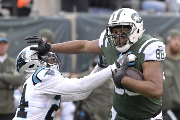 Carolina Panthers cornerback James Bradberry (24) attempts to tackle New York Jets tight end Austin Seferian-Jenkins (88) during the first half of an NFL football game, Sunday, Nov. 26, 2017, in East Rutherford, N.J. (AP Photo/Bill Kostroun)