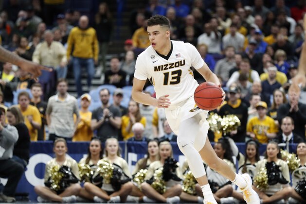 Missouri's Michael Porter Jr. brings the ball down the court during the first half in an NCAA college basketball game against Georgia at the Southeastern Conference tournament Thursday, March 8, 2018, in St. Louis. (AP Photo/Jeff Roberson)