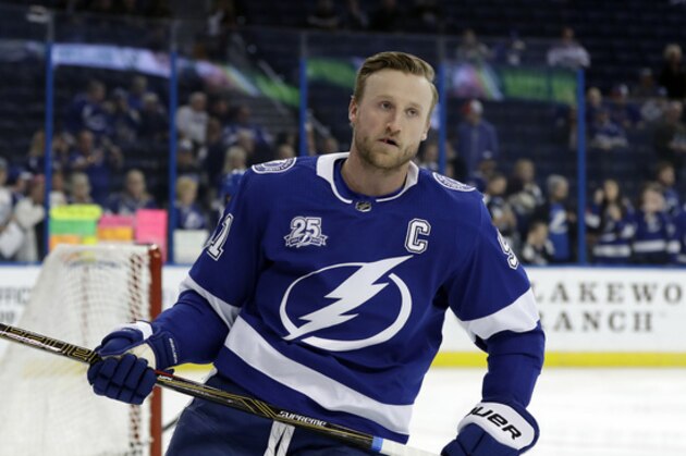 Tampa Bay Lightning center Steven Stamkos (91) skates in warm-ups prior to an NHL hockey game against the New York Rangers Thursday, March 8, 2018, in Tampa, Fla. (AP Photo/Chris O'Meara)