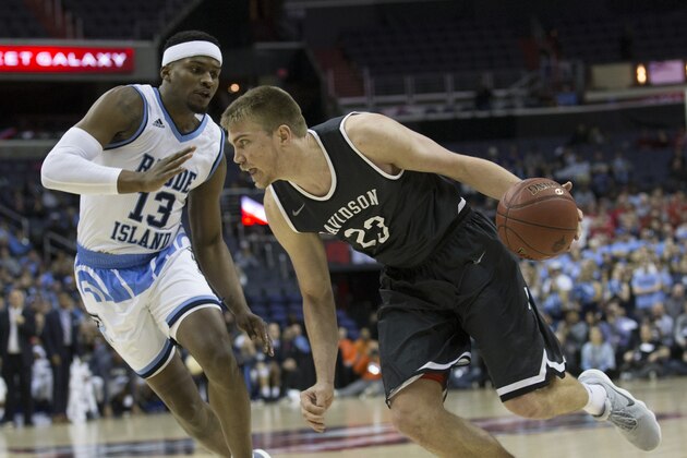 WASHINGTON, DC - MARCH 11: Peyton Aldridge #23 of the Davidson Wildcats drives to the basket against Stanford Robinson #13 of the Rhode Island Rams in the Championship game of the Atlantic 10 Basketball tournament at Capital One Arena on March 11, 2018 in Washington, DC. (Photo by Mitchell Leff/Getty Images)